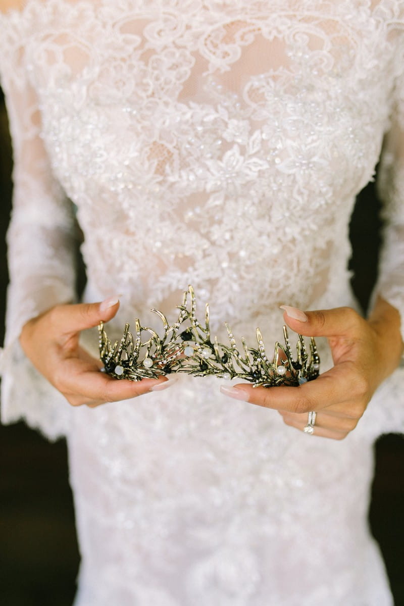 Bride holding tiara in hands