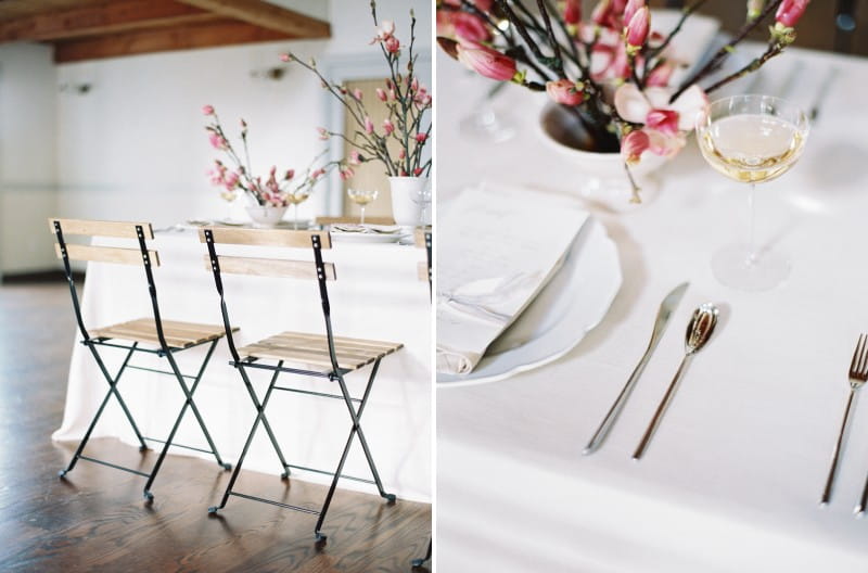 Wood and metal wedding chairs and cutlery at place setting