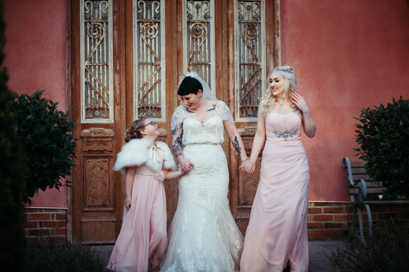 Bride with flower girl and bridesmaid