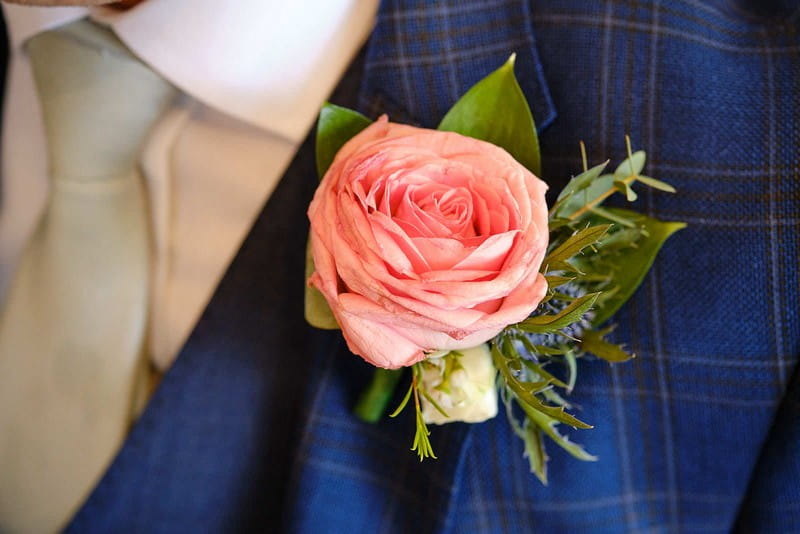 Pink rose buttonhole