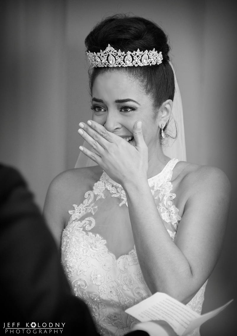 Emotional bride during wedding ceremony - Picture by Jeff Kolodny Photography