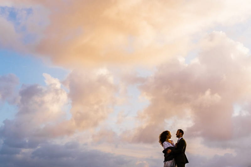 Clouds in sky behind bride and groom - Picture by Babb Photo