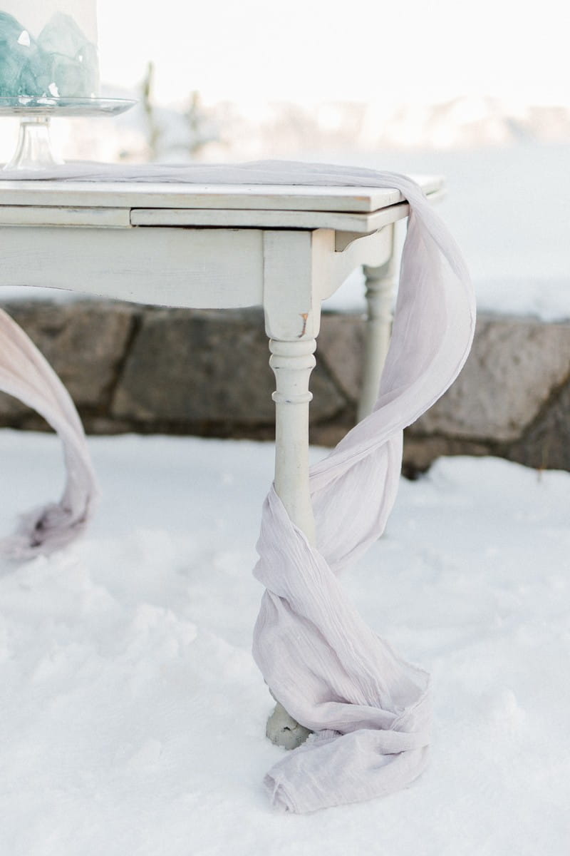 Linen runner hanging off table