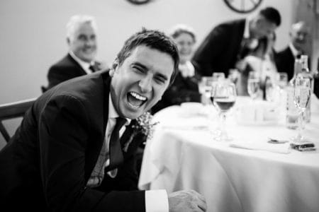 Man laughing at wedding - Picture by Damian Burcher