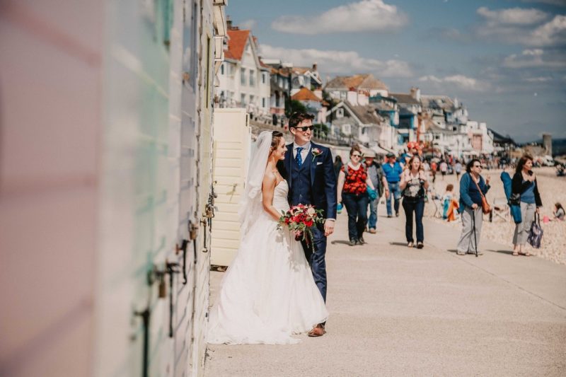 Bride and groom on Lyme Regis seafront