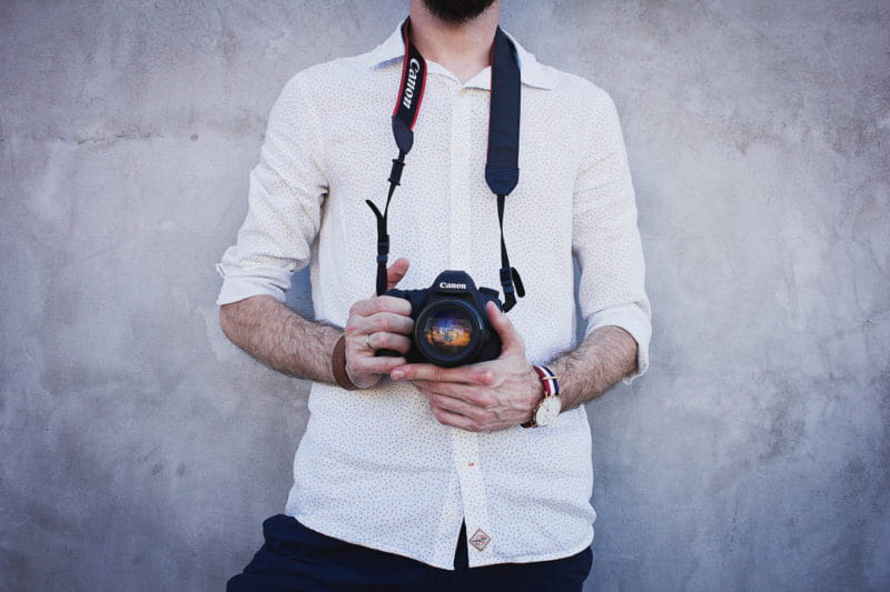 Photographer Holding Camera
