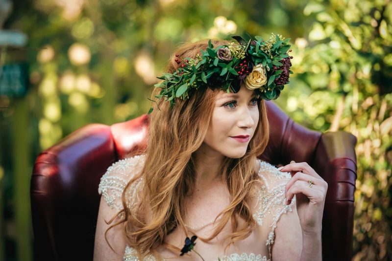 Bride with red hair wearing flower crown