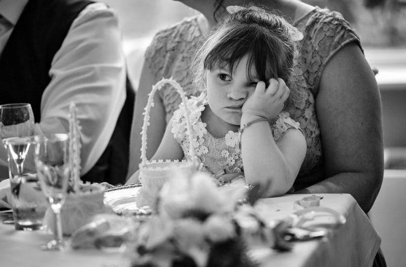 Young girl bored at wedding