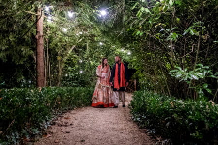 Bride and groom walking through grounds of Manor by the Lake - Picture by Capture Every Moment