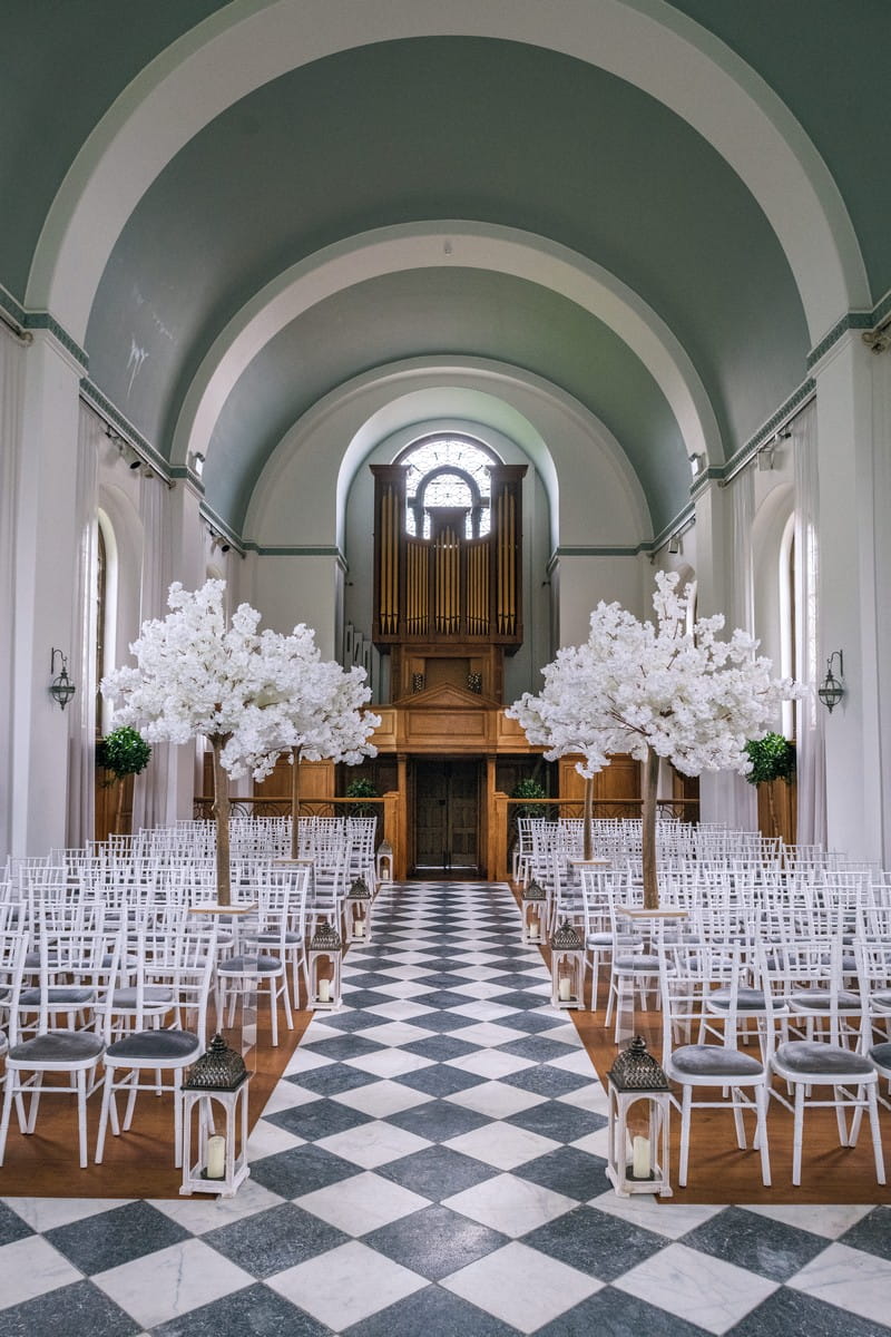 Wedding ceremony seating in The Chapel at Hawkstone Hall