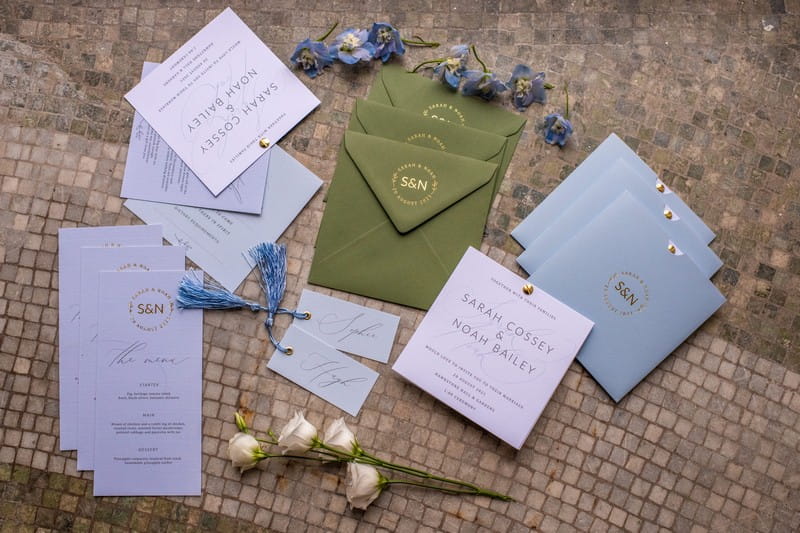 Pale blue, green and ivory wedding stationery