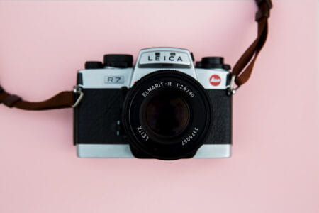 Leica Camera On Pink Background