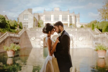 Bride and groom touching heads in front of Euridge Manor - Picture by Joab Smith