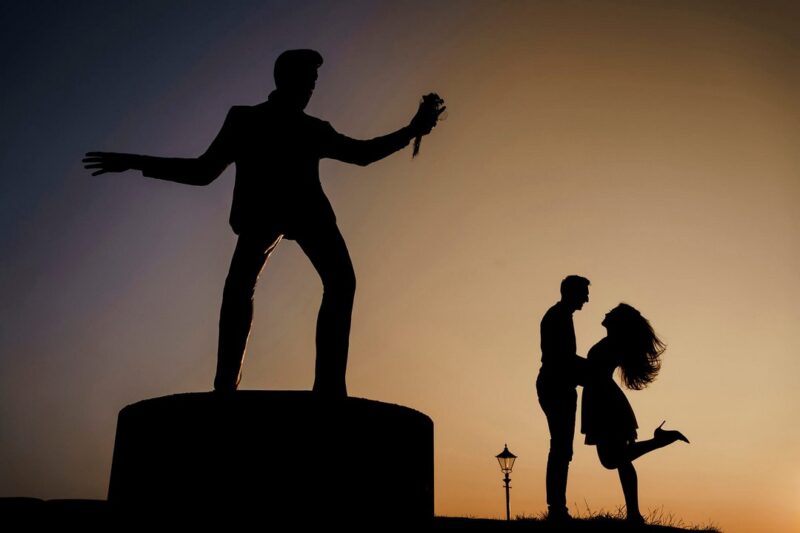 Silhouette of couple next to Elvis statue - Picture by Stephen Walker Photography