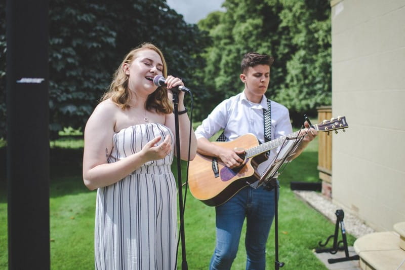 Acoustic duo providing outdoor wedding music