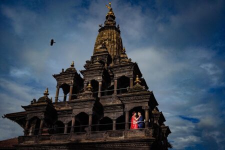 Bride and groom on Sri Krishna Mandir in Patan Durban Square - Picture by Soven Amatya Photography